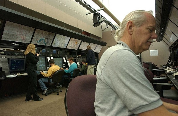  Air route traffic controllers at work at the Washington ARTCC. 